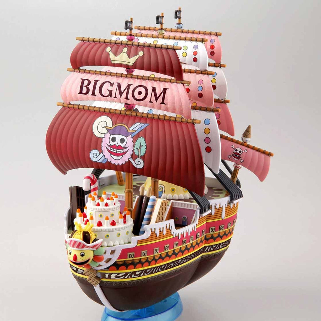 Model ship with 'BIGMOM' on a gray background