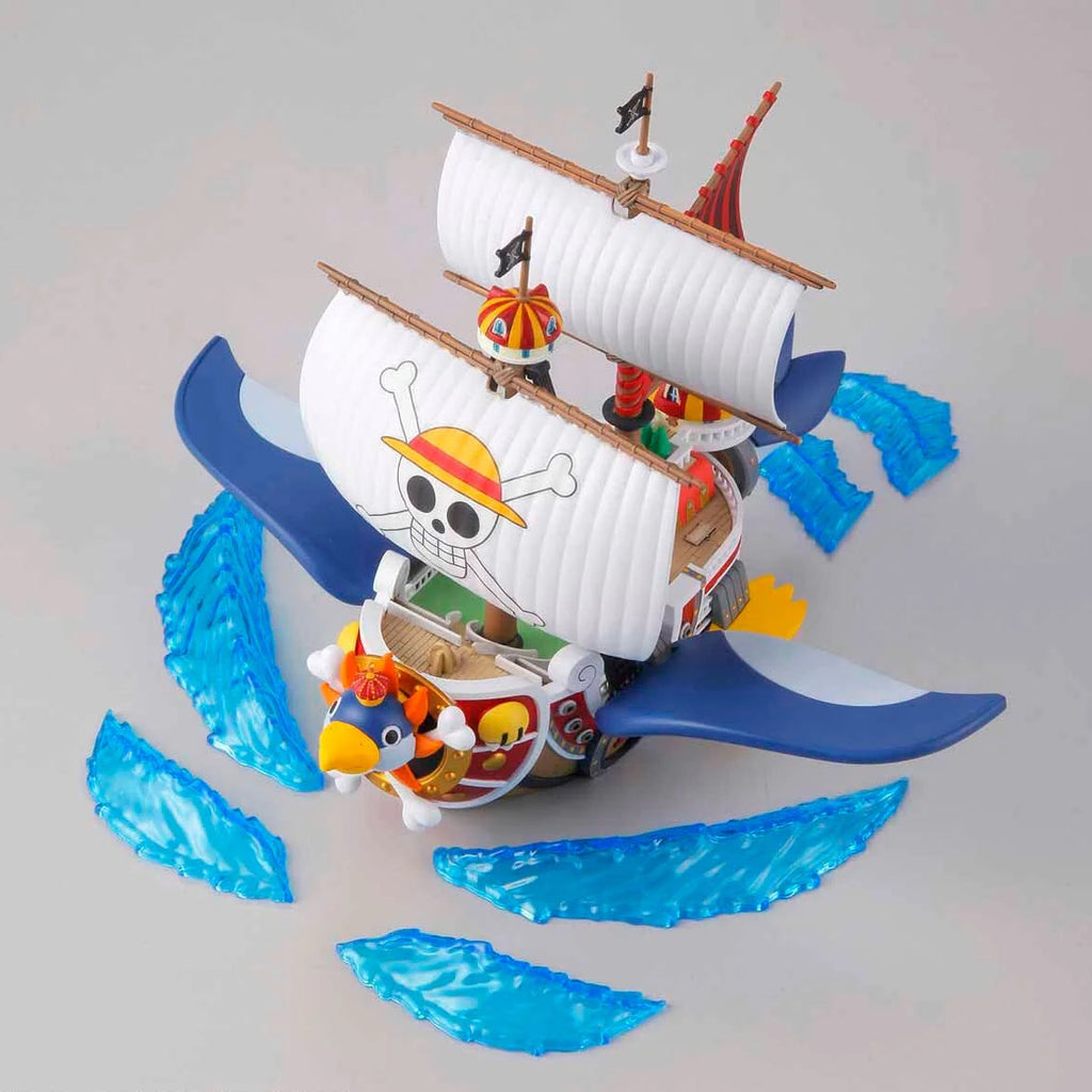 Model ship with character figures on a gray background