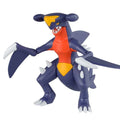Toy figure of a blue and orange creature on a white background