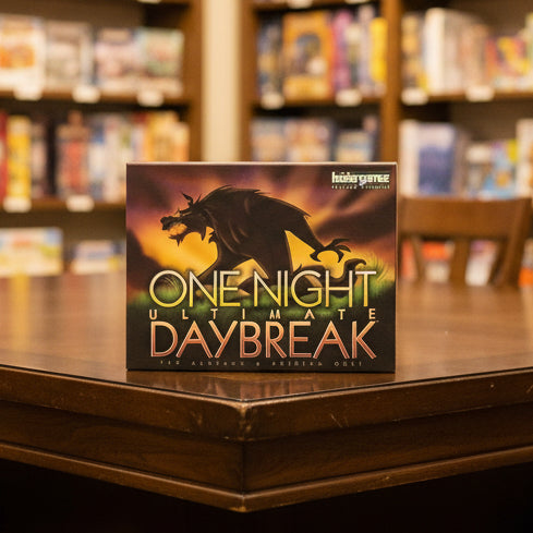Board game box for 'One Night Ultimate Daybreak' with a horse silhouette on a dark background.
