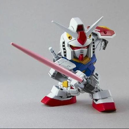 Model robot figure with a sword on a gray background