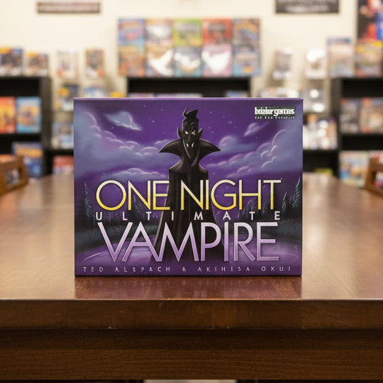 Board game box for 'One Night Ultimate Vampire' with a dark figure against a purple night sky.
