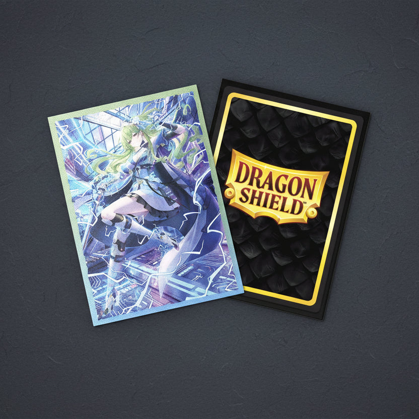 Card with dragon design and Dragon Shield packaging on a white background