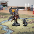 Two fantasy figurines with a large one and a smaller one, both featuring detailed armor and weapons, on a white background with 'Dungeons & Lasers' logo.