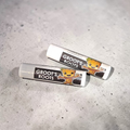 Two 'Groot's Roots' products on a gray surface