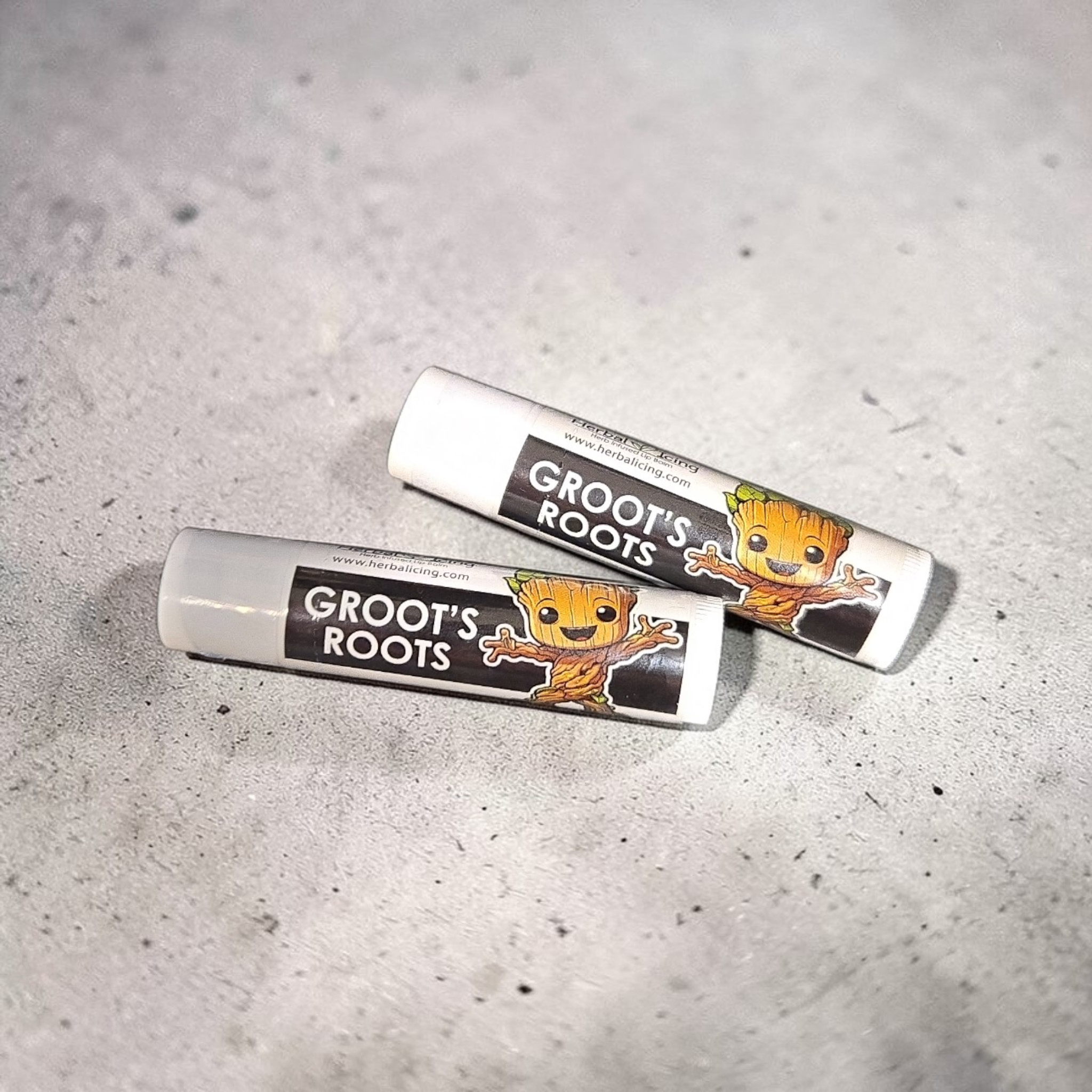 Two 'Groot's Roots' products on a gray surface