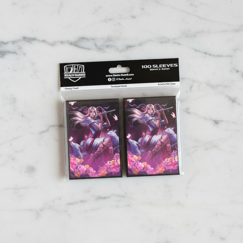 Pack of card sleeves with a character design on a white background