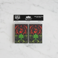 Pack of trading card sleeves with a red green mana design on a white background