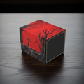 Red and black box with tree design on a gray background