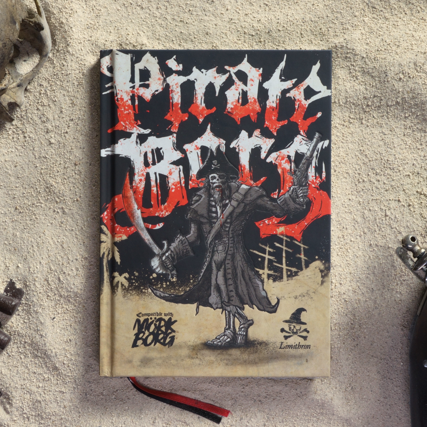 Book titled 'Pirate's Mate' with pirate-themed cover on a sandy surface with skull and gun.