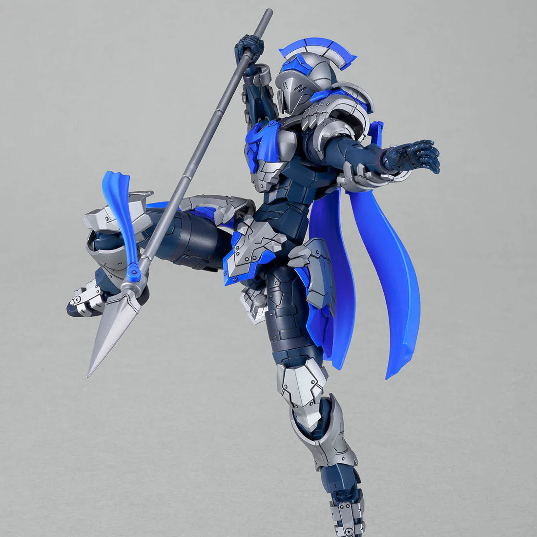 Mechanical figure with blue and silver design on a gray background