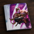 A hardcover notebook or journal featuring a vibrant fantasy illustration of a horned warrior holding a spear, set against a purple and white background with a small stylized logo in the bottom right corner.