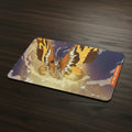 Playmat with a mothra design and universus logo on a white background